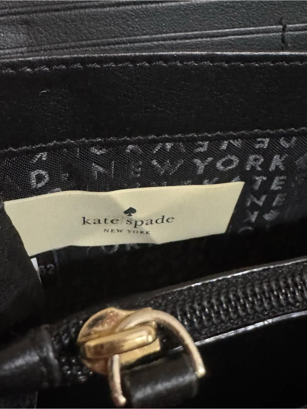 kate spade Black and White Check Zip-Around Wristlet with Pearl Strap